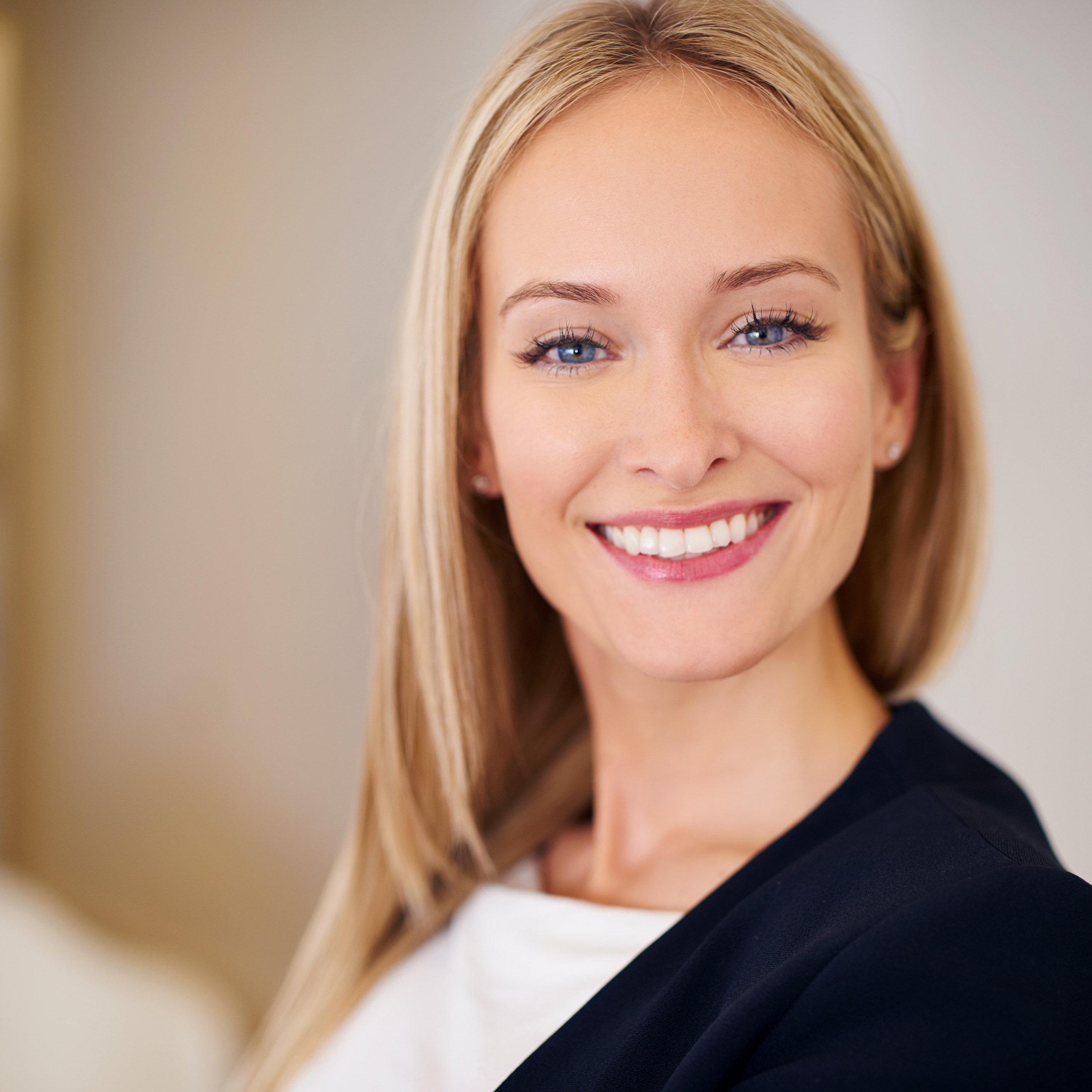closeup-happy-portrait-business-woman-office-workspace-confident-corporate-career-female-person-employee-legal-worker-as-lawyer-attorney-solicitor-amsterdam.jpg