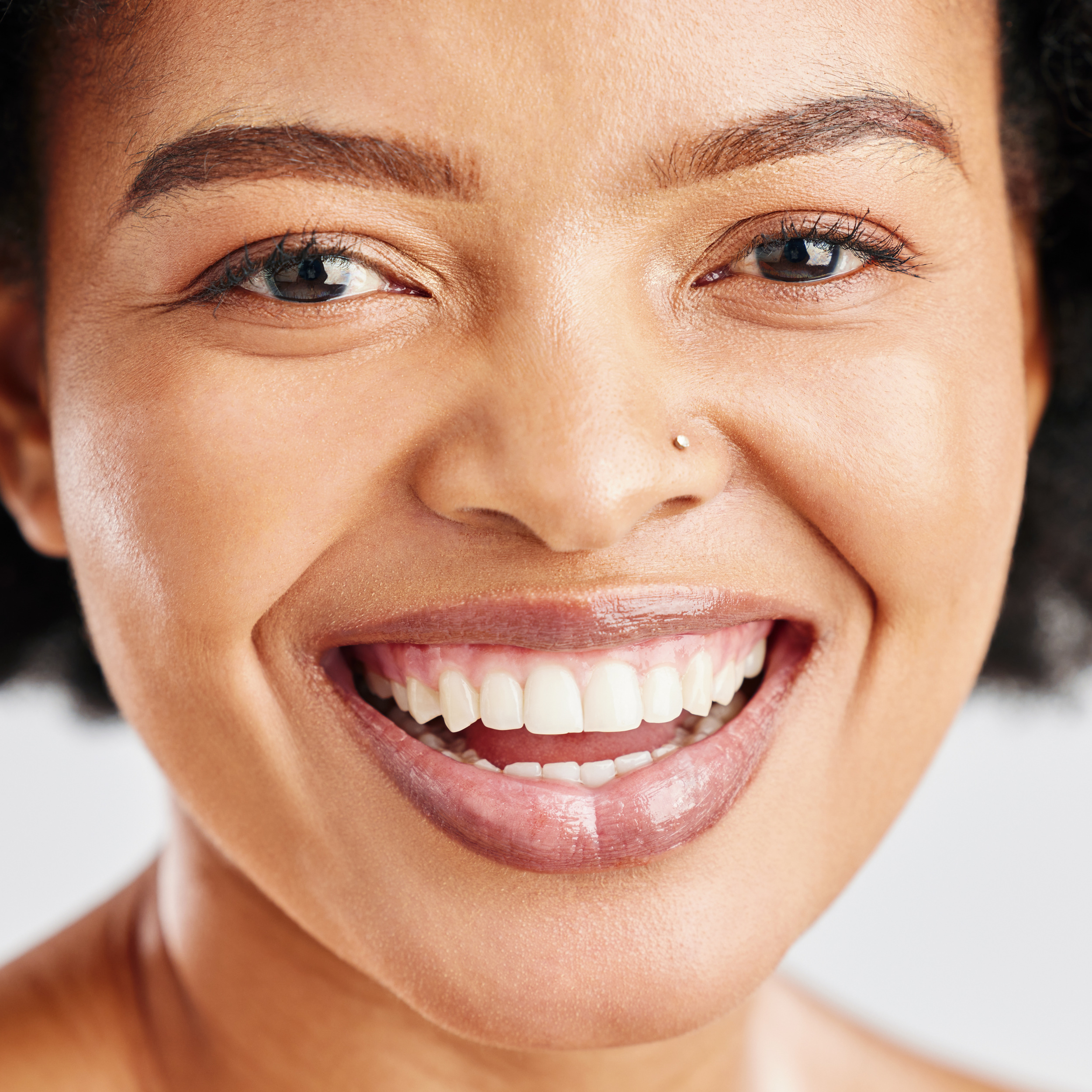 portrait-skin-care-beauty-black-woman-with-dermatology-cosmetics-natural-makeup-closeup-face-happy-african-female-model-studio-facial-glow-self-love-teeth-smile-1.jpg